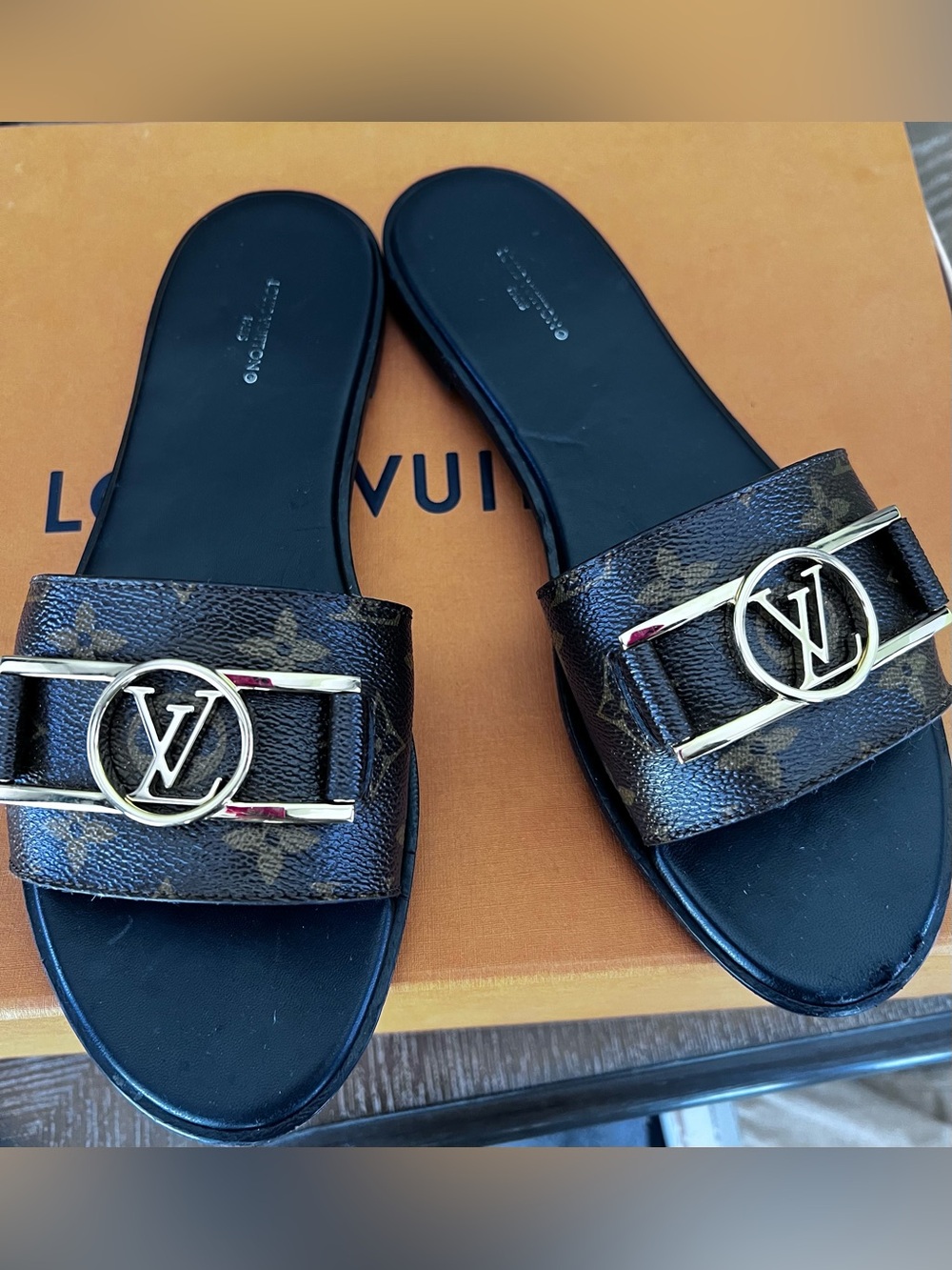 Louis Vuitton lock it slides